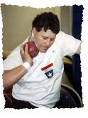 Gary England, 1999 M40 shot put winner (52-10 3/4), NMIC. Photo by Suzy Hess, National Masters News