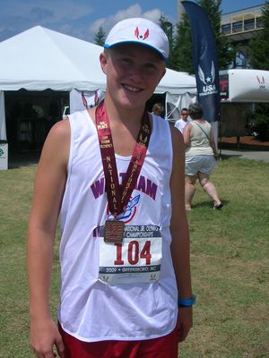 John Henry Fitzgerald displays his national medal (Photo: Waltham TC)