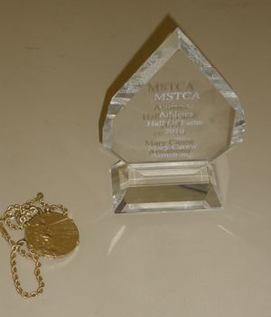 Hall of Fame Award of Mary Carew Armstrong, and her Olympic gold medal from 1932. (courtesy Steve Vaitones)