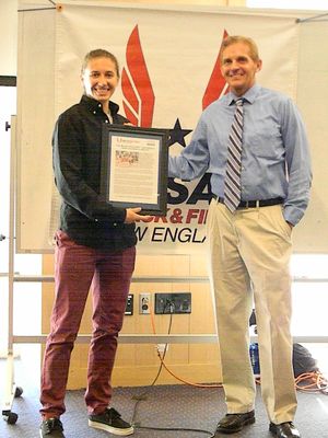  Carly Muscaro receives the Athlete of the Month plaque from Dr. John Oleski. (USATF-NE photo)